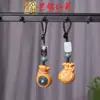Sándalo Tallado Forma de Dibujos Animados Cadena para Teléfono Móvil Llavero de Coche Colgante Yiming Xianyuan Colgante Creativo Colgante para Bolso