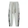 Pantalones Jogger de Marca de Moda Estampado de Otoño Pantalones Casuales Nuevos para Exteriores Sueltos Versátiles Pantalones para Hombre Verano
