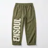 Calça de Moletom Personalizada com Cordão Estampada Direto da Fábrica Calça Casual Reta Solta Americana Estilo de Rua Calça Longa com Letras Laterais