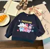 Niños y Niñas Primavera y Otoño 2025 Nuevas Camisetas Casuales Atuendos de Moda para Niños Pequeños Lindo Dibujo Animado Labubu Versátil Algodón