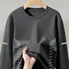 Camiseta casual versátil de manga larga para hombre para otoño, cuello redondo, color liso moderno, cómoda, transpirable y de corte holgado.