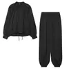 Ropa de mujer transfronteriza 2026 Moda europea y americana chaqueta holgada con cremallera y mangas abullonadas + conjunto de pantalones largos para mujer E5260587