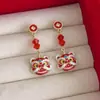 Aretes León Despertando Sentido del Diseño Asimétrico Nuevo Estilo Chino Estilo Nacional Aretes Lujo Ligero Gama Alta Año Nuevo Festivo Aretes Año Nuevo