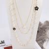 Collar de temperamento para mujer, largo, moda, multicapa, pequeño aroma, colgante de perla, otoño e invierno, cadena decorativa Joker para suéter, disponible al por mayor