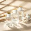 Ventas Directas de Fábrica de Botellas de Perfume de Vidrio en Stock, Botellas de Relleno de Perfume de Gama Alta, Botellas de Spray de Perfume con Nuevo Diseño Romano, Botellas Vacías