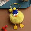 Nuevo Lindo Pompon Peludo de Moda con Forma de Pie Pequeño Colgante de Bolsa Dibujo Animado Regalo Muñeco para Coche Llavero Venta al Por Mayor