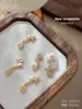 Acessórios para Nail Art Ano Novo do Cavalo Zircônia, Estilo Levemente Luxuoso, Cor Dourada, Trazem Riqueza Instantânea, Liga Metálica Brilhante Incrustada com Diamantes, Diamantes para Unhas Atacado