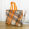 En stock Bolsas recubiertas de tela no tejida Zapatos Compras Ropa Bolsos Bolsas no tejidas Impresión publicitaria LOGOTIPO