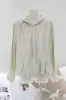 Camisa con Protección Solar Entrelazada para Mujer, Nuevo Estilo Primavera y Verano 2026, Corte Holgado, Lujo Ligero, Alta Calidad, Color Sólido, Chaqueta Delgada
