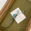 Mismo collar de piedra natural moteada multielemento de blogger para mujer, accesorios de cadena larga para suéter de otoño e invierno, colgante de corazón de uva