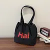 Versão Coreana Transfronteiriça 2026 Verão Nova Bolsa Tote Casual Grande Capacidade com Estampa de Carta Leve Estilo Preguiçoso Bolsa de Ombro