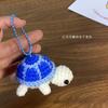 Llavero de tortuga linda transfronteriza Mini tortuga de lana tejida a ganchillo Muñeca de dibujos animados Bolso creativo Colgante terminado