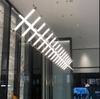 Tienda de ropa minimalista, bar, oficina, combinación, lámpara Mazar, salón de té, vestíbulo de hotel, área de descanso, cajero, restaurante, lámpara de araña