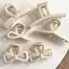 Elegante pasador estilo blanco arroz para mujer, pinza para el pelo de moño en la parte trasera de la cabeza, nuevo clip de tiburón 2025, pasador simple versátil, tocado