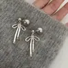 Pendientes de Aro con Lazo Perla Gris para Mujer Frescos de Gama Alta Largos Elegantes Retro Versátiles Nuevos Pendientes