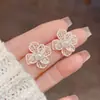 Brincos Stud Flor Pérola com Óleo Drip Nova Moda Primavera Versátil para Mulheres Elegantes Leve Luxo Simples Frescos Pequenos Brincos Atacado