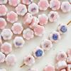 Joyería de cerámica de Jingdezhen rosa agujero grande cuentas sueltas paquete de material de bricolaje tejido a mano estudiante pulsera de cuentas cesta