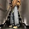 Jeans de mezclilla otoñales estilo americano para hombre, pantalones rectos negros de peso pesado, pantalones largos versátiles casuales de moda acampanados de alta costura para hombre