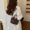 Bolso Nuevo Mujer 2026 Estilo Caliente Bolso Cubo Nicho Temporada Otoño/Invierno Tejido Retro Bolso de Hombro Cruzado Bolso de Mano