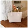 Bolso tote tejido de gran capacidad para mujer, bolso de hombro ligero e impermeable de cuero PU, adecuado para estudiantes y para ir al trabajo.