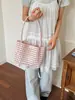 Bolsa de playa tejida hueca de venta caliente para mujer, nuevo modelo 2026, bolso de hombro exquisito, bolsa de playa casual para vacaciones