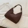 Bolso cruzado casual simple de color liso de gamuza de alta gama 2026 nuevo otoño con textura moda bandolera para mujer