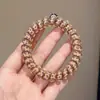 Goma para el pelo de alambre de teléfono con estampado de leopardo retro, alta elasticidad, banda de goma sin marcas para adultos, adecuada para coletas, simple y elegante, no daña el cabello