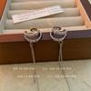 Pendientes de clip para mujer, elegantes, de lujo, con borlas largas y incrustaciones de diamantes de doble capa, sencillos y distintivos, de una sola pieza.