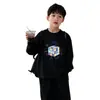 Camiseta de manga larga de algodón puro para niños, nuevo modelo 2026, top para niños, estilo coreano, versátil, casual, camiseta básica para niños pequeños en primavera y otoño