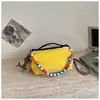 Venta al por mayor transfronteriza de bolsos pequeños de tela de mano casuales simples para exteriores, bolsos cuadrados de nicho con bloques de color para commuting, bolsos de hombro y cruzados