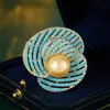 Novo Anel Retro Azul Turquesa de Outono e Inverno Broche de Pérola Broche Pesado de Luxo Versátil para Mulheres Acessórios de Casaco para Mulheres