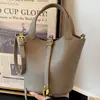 Colección de otoño 2026 nueva para mujer Ruien: un bolso bandolera elegante y casual con un acabado texturizado, que ofrece una gran capacidad y un look moderno