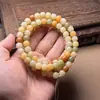 Pulsera de mano de múltiples bucles con 108 raíces de Bodhi de Dunhuang rica y colorida quemada con carbón, cadena de lana, placa trasera para hombres y mujeres.