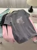 Camiseta de Manga Larga con Bloques de Color de Pony de Dibujos Animados para Mujer, Nueva Moda Versátil Elegante de Principios de Primavera 2026