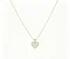 Nuevo Collar de Cobre de Lujo Ligero con Circonita Cúbica Incrustada de Seis Garras para Mujer Cadena para Clavícula de Temperamento Dorado Corazón
