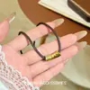 Novo Colar Dourado Tubo Redondo Pequeno Estilo Chinês, Requintado e de Alto Padrão, com Design de Nicho e Toque Criativo, Adequado para Uso Diário, Colar Simples e Versátil