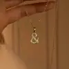 Collar de Trébol de Cuatro Hojas Hueco Brillante en Forma de Corazón Modelo Nuevo 2026 Lujo Ligero Exquisito Elegante Diseño de Nicho Cadena para Clavícula Hecho a Medida