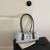 Bolso de Hombro Retro de Nicho Francés para Mujer 2026 Otoño Nuevo Bolso de Bowling Simple de Moda Portátil para el Viaje Diario