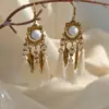 [Selección Premium] Pendientes Largos con Borlas Tejidas de Plumas Estilo Étnico Vintage para Mujer Pendientes Huecos de Gama Alta Bohemios