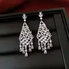 Pendientes colgantes de borla con circonita de aguja plateada en forma de gota de agua, de moda de alta gama de lujo ligero, pendientes de botón elegantes con temperamento para mujer, nicho