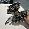Nuevo Estilo Francés Sentido de Alta Gama Pinza Twist de Cuadros Camelia Lazo de Felpa Pequeño Estilo Chanel Corea del Sur Dulce Elegante Tocado
