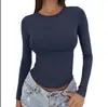 2026 Amazon nueva camiseta básica versátil de manga larga con cuello redondo, corte ajustado, estilo europeo y americano, para primavera y otoño, color liso, corte ajustado para mujer