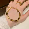 Pulsera Popular de Ojo de Tigre Cepillado Exquisito Ojo de Gato con Cuentas de Xiaohongshu Pulsera Versátil de Lujo Ligero para Mujer Dropshipping
