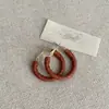 Aretes Redondos Envueltos en Cuero de Aguja Plateada, Aros Artísticos Retro Simples, Pendientes de Lujo Ligero de Moda de Alta Gama al por Mayor para Mujer