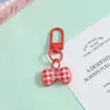 Llavero creativo de lazo a rayas de colores, accesorio colgante DIY, decoración fresca y elegante para bolsos de hombre y mujer
