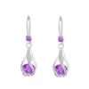 Traje de joyería de cristal de circón de venta caliente transfronteriza para mujer, diseño creativo retro europeo y americano, collar de aretes de gota de agua giratoria, moda