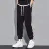 Pantalones de Chándal para Hombre Transfronterizos Sueltos para Hombre Otoño Nuevo Estilo Pantalones Casuales Marca Tendencia Juvenil Versátiles Deportivos Pantalones con Cordón para Hombre