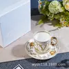 Ougefan Estilo Europeo Lujo Ligero Blanco Forma de V Exquisita Porcelana de Hueso Tetera Taza de Café Juego para el Té de la Tarde Juego de Té para Fiesta