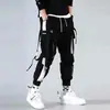Estilo de Rua Hip-Hop Tendência Marca Solto Esportivo Funcional Macacão Masculino Carta Bolso Grande com Aba Calça Fita Casual Calça Arco-Íris