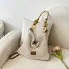 Bolsa de Praia Tecida para Férias na Costa Mulheres 2026 Nova Bolsa de Mão de Tricô Vazado Grande Capacidade Bolsa de Ombro Único